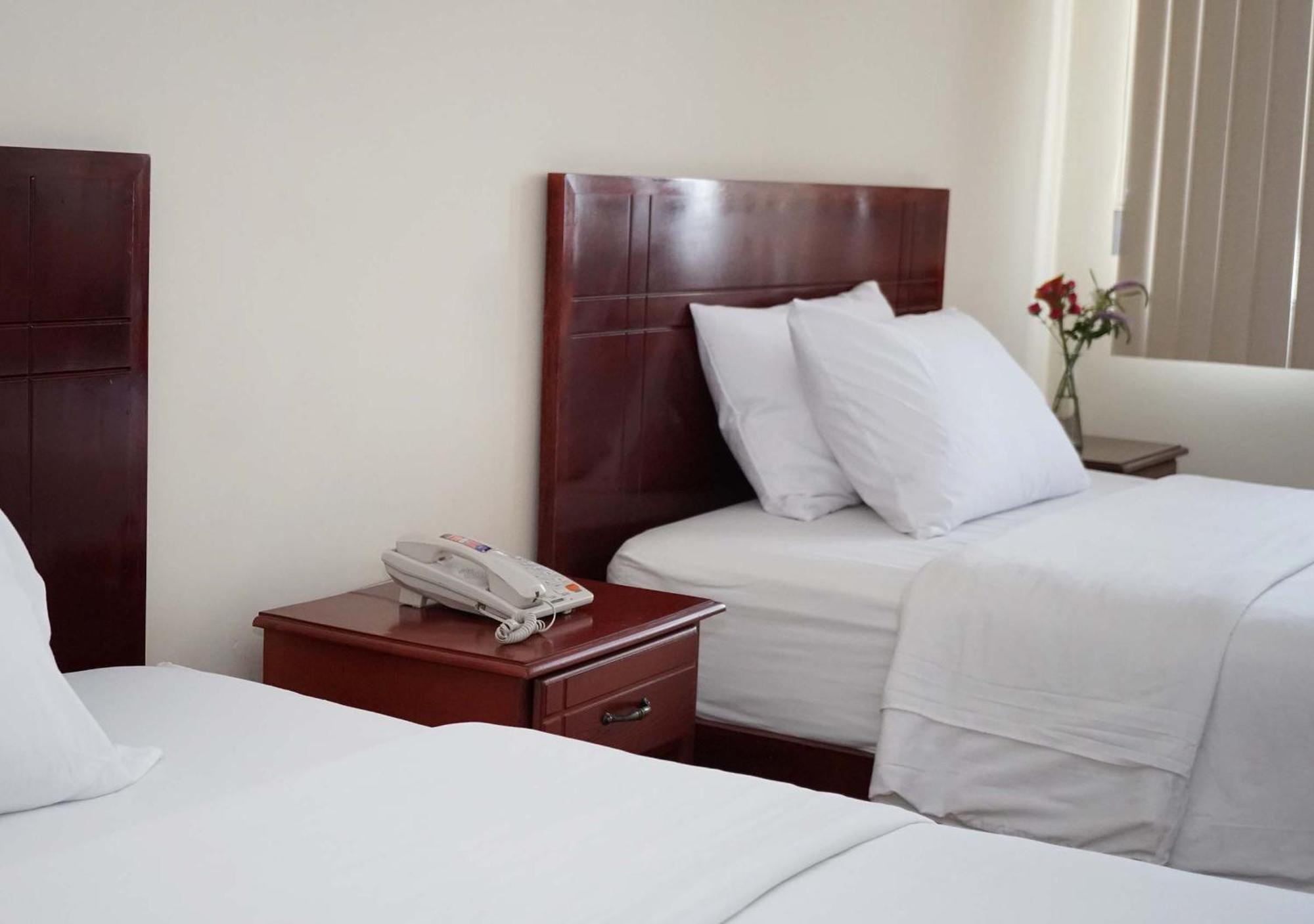 Hotel Lottus Quito Habitación foto