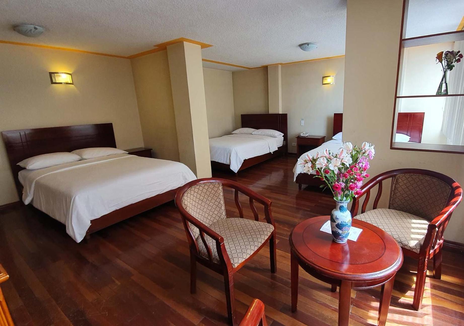 Hotel Lottus Quito Habitación foto
